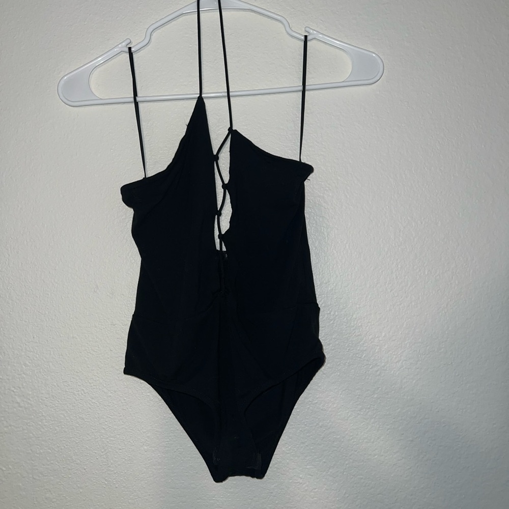 Black body suit with zig zag cut out